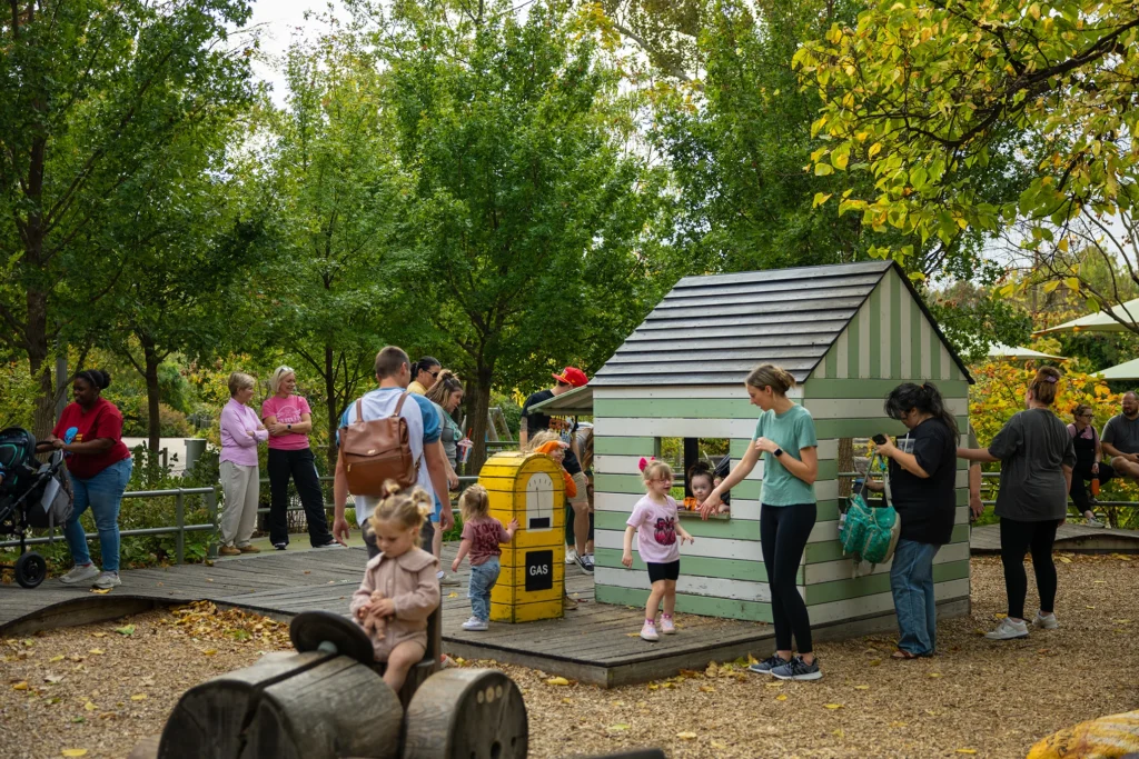 Families play at the Gathering Place during the Family Learning Center field trip.